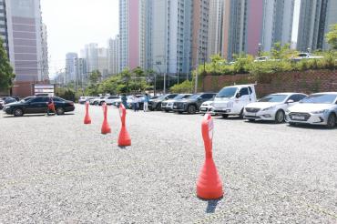 산록 임시 공영주차장 준공식의 사진